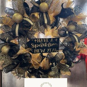 Festive Black and Gold New Year Wreath